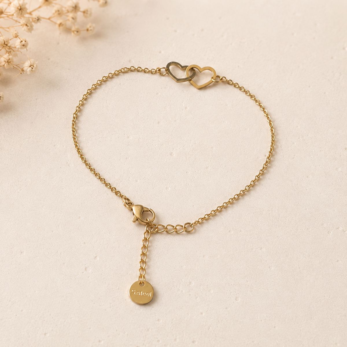 Bracelet AMORE en acier inoxydable doré avec deux cœurs enlacés - MissZa