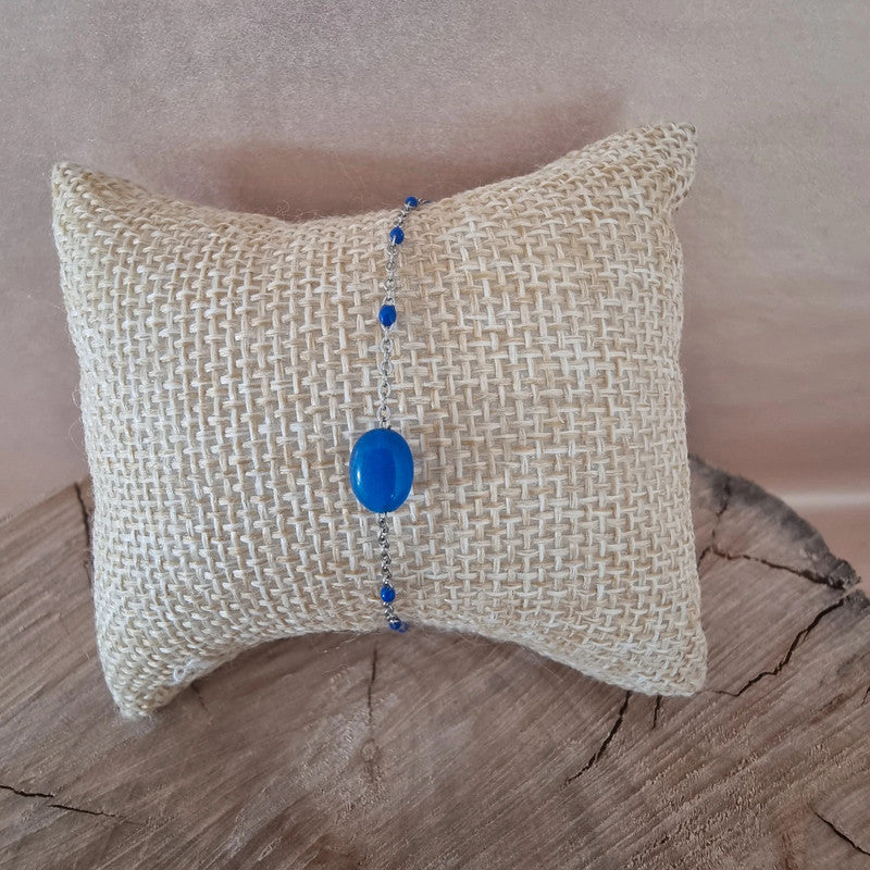 Bracelet chaîne argentée avec perles bleues